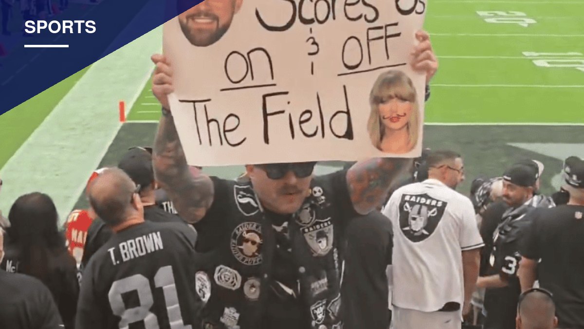 Raiders Fan's Sign Mocking Travis Kelce and Taylor Swift Goes Viral After Allegiant Stadium Loss
